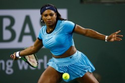 Serena Williams of USA in action against Agnieszka Radwanska of Poland during day twelve of the BNP Paribas Open at Indian Wells Tennis Garden on March 18, 2016 in Indian Wells, California.
