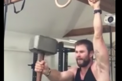 Chris Hemsworth catches Thor's hammer while exercising.