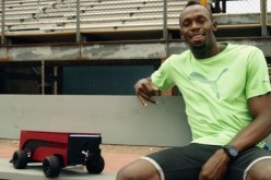 Usain Bolt is seen with the Puma BeatBot