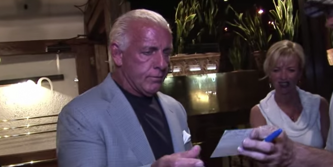 Wrestling manager Ric Flair always travels with his buddies.  