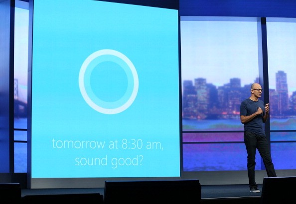 Microsoft CEO Satya Nadella demonstrates Cortana, as he delivers a keynote address during the 2014 Microsoft Build developer conference on April 2, 2014 in San Francisco, California.   