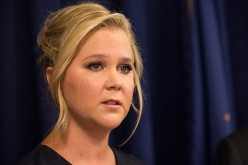 Amy Schumer speaks at a press conference with U.S. Senator Chuck Schumer calling in 2015.  