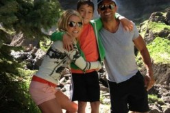 Kelly Ripa and Mark Consuelos posed together during a trip with their son.