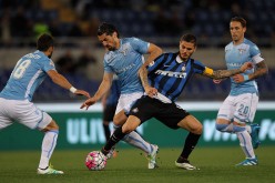 Inter Milan striker Mauro Icardi (middle) against three Lazio defenders.