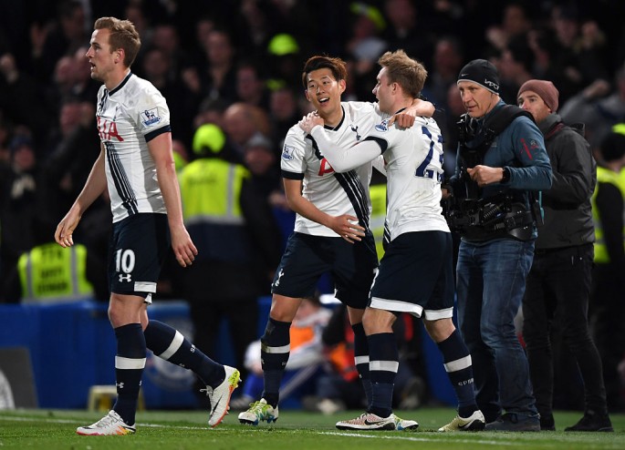 Tottenham Hotspur winger Son Heung-min (middle) celebrates scoring his goal against Chelsea with teammates Erik Lamela (R) and Harry Kane.