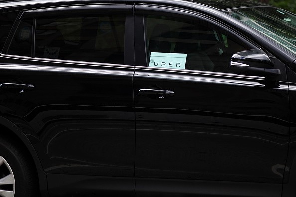 An Uber vehicle is seen in Manhattan on July 20, 2015 in New York City.